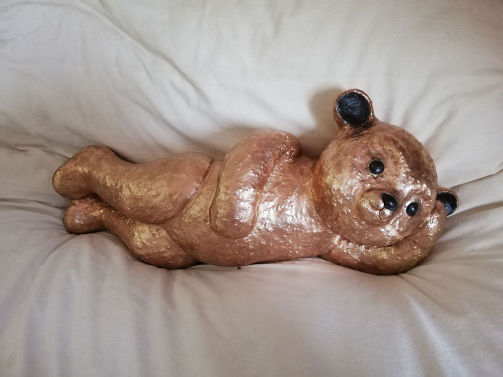 Nounours bronze couché