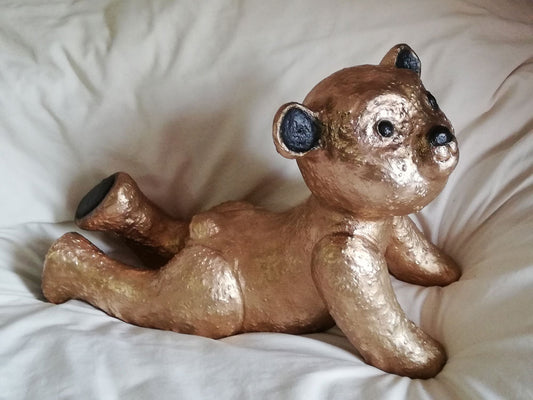 Nounours bronze sur le ventre